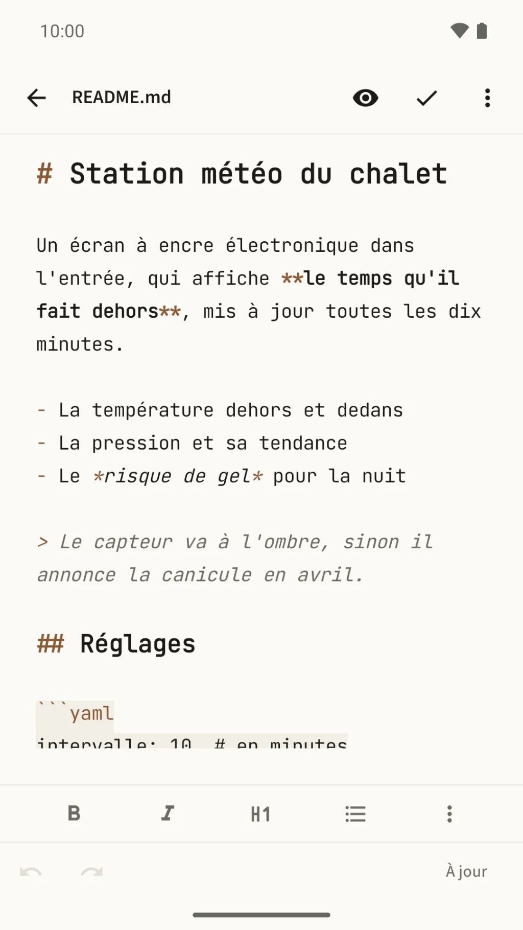 L'éditeur d'Octothorpe dans le thème Papier, mis en forme pendant la saisie : un fichier README avec un titre, du gras, une liste et une citation, chaque signe en vue et teinté, l'œil dans la barre du haut, et la barre de mise en forme en bas